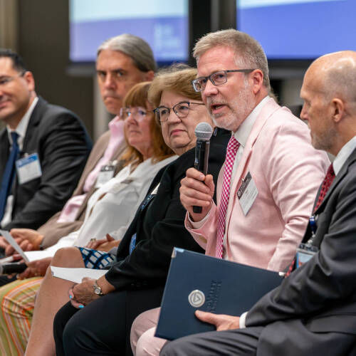 Brooks College of Interdisciplinary Studies Dean Mark Schaub, second from right, speaks during a College of Computing brainstorming session at the DeVos Center for Interprofessional Health on August 7.